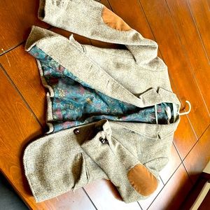 Coat with elbow patches